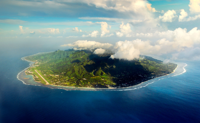 Travel Associates rarotonga island from above with cloud on top