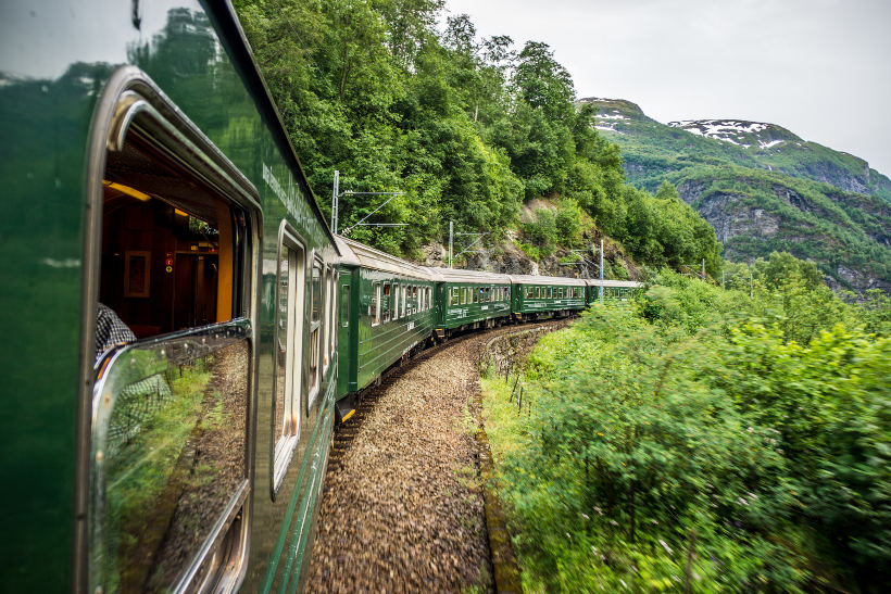 Travel Associates flam railway in lush mountains