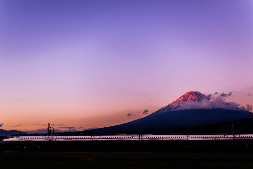 Travel Associates japan rail infront of mount fuji at dusk