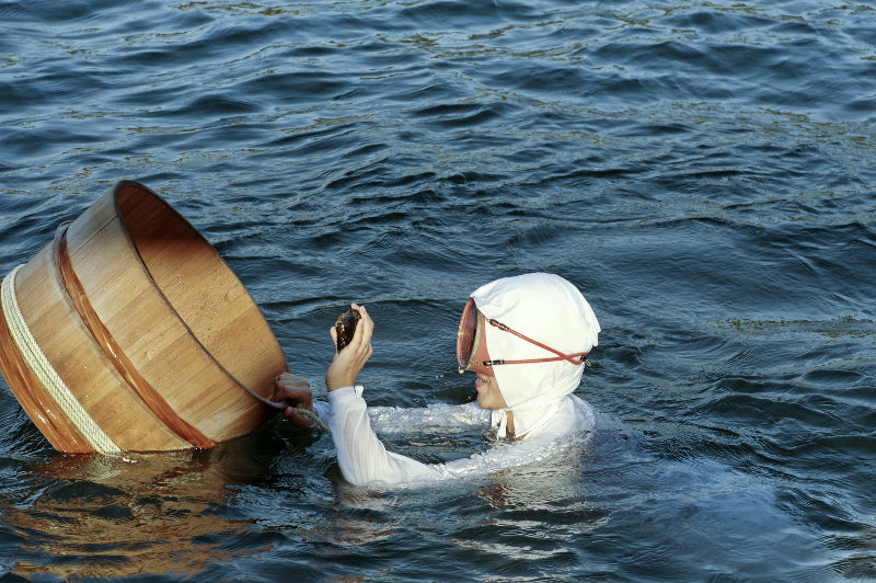 Japanese pearl diver in water