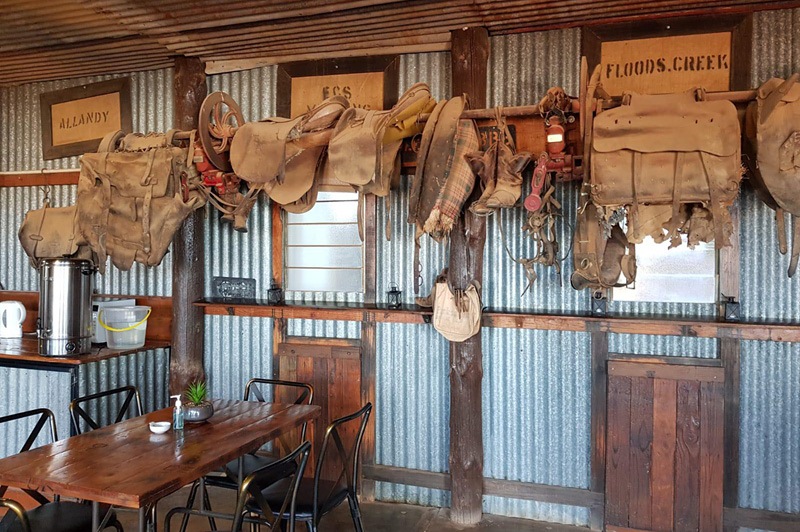 Saddles on display at the Packsaddle Hotel