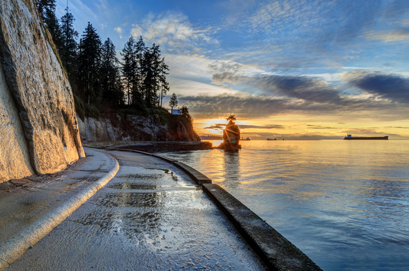 The sea wall in Vancouver, with sun setting in background