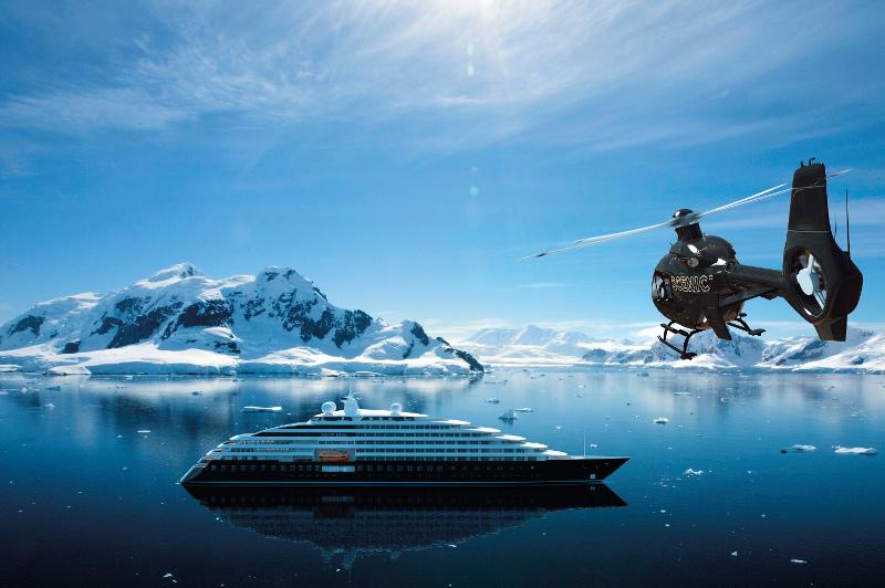Cruise ship and helicopter in icy ocean location